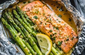 Baked Salmon in Foil with Asparagus and Lemon Garlic Butter Sauce